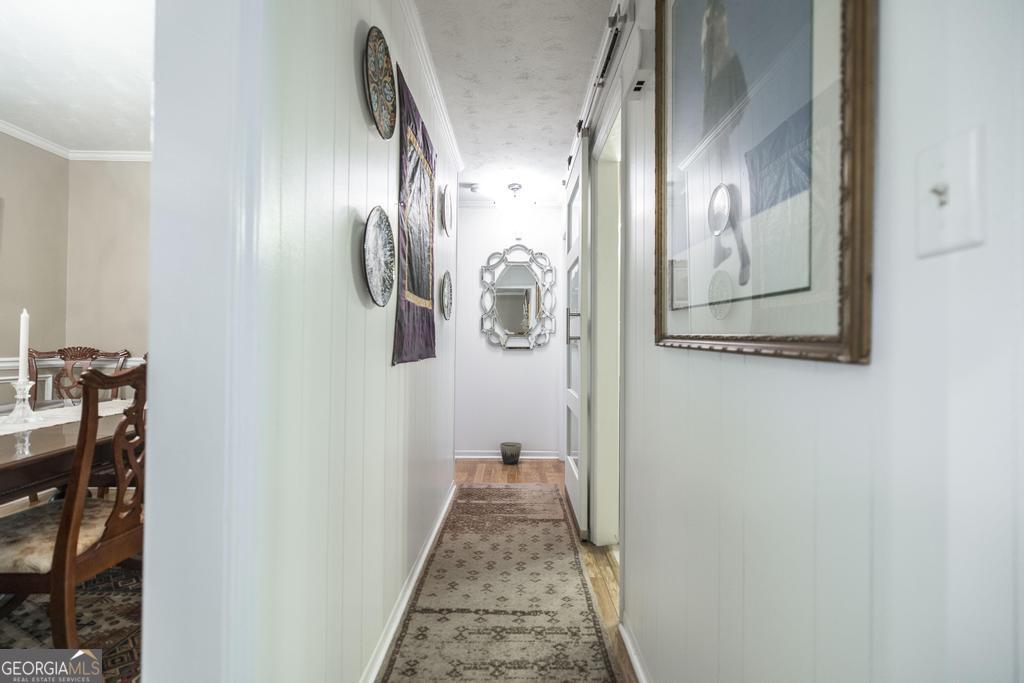 209 Spillers Street Fort Valley, GA 31030 - Photo 24 of 36 a view of a hallway with wooden floor
