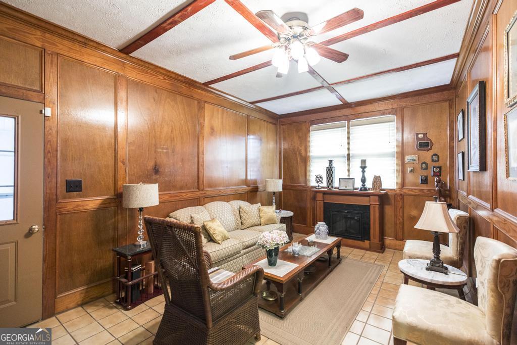 209 Spillers Street Fort Valley, GA 31030 - Photo 27 of 36 a living room with furniture and a large window