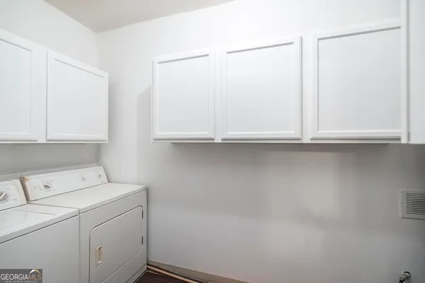 front view of a house with a large window