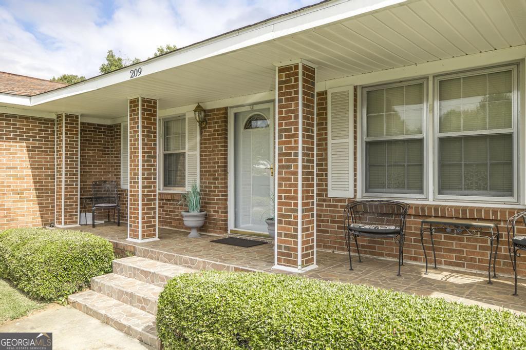 209 Spillers Street Fort Valley, GA 31030 - Photo 30 of 36 front view of a house with a large window