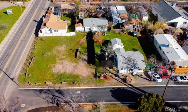 an aerial view of a house with swimming pool
