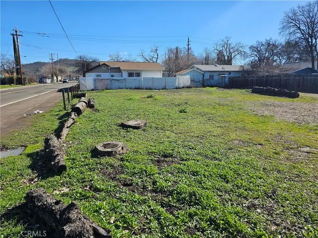 a view of a lake with a building in the background