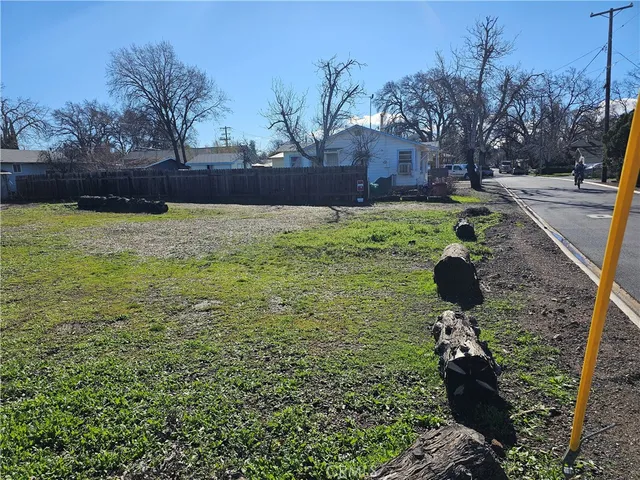 a backyard of a house with lots of green space