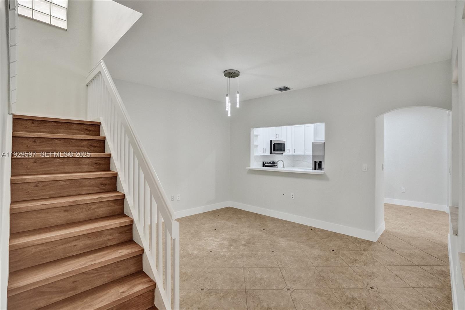 4120 Fern Forest Road Cooper City, FL 33026 - Photo 12 of 44 a view of an entryway with wooden floor