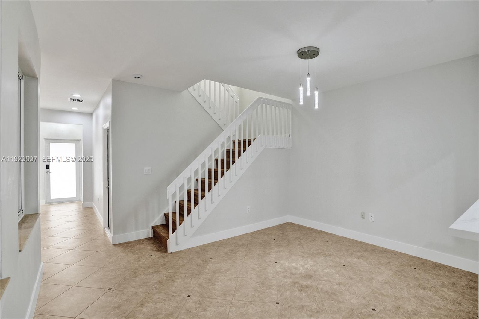 4120 Fern Forest Road Cooper City, FL 33026 - Photo 13 of 44 a view of a hallway with staircase