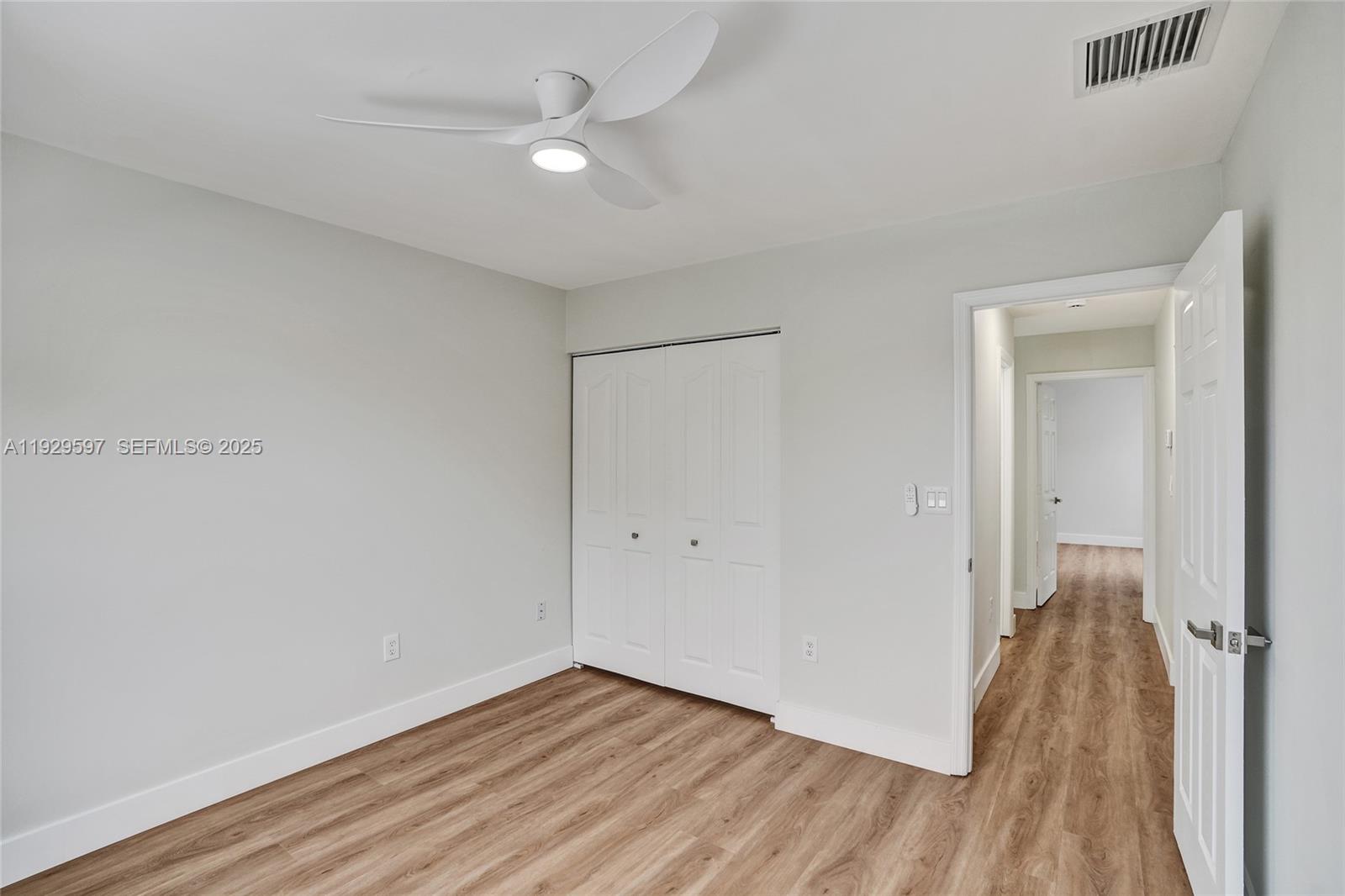 4120 Fern Forest Road Cooper City, FL 33026 - Photo 24 of 44 wooden floor in an empty room