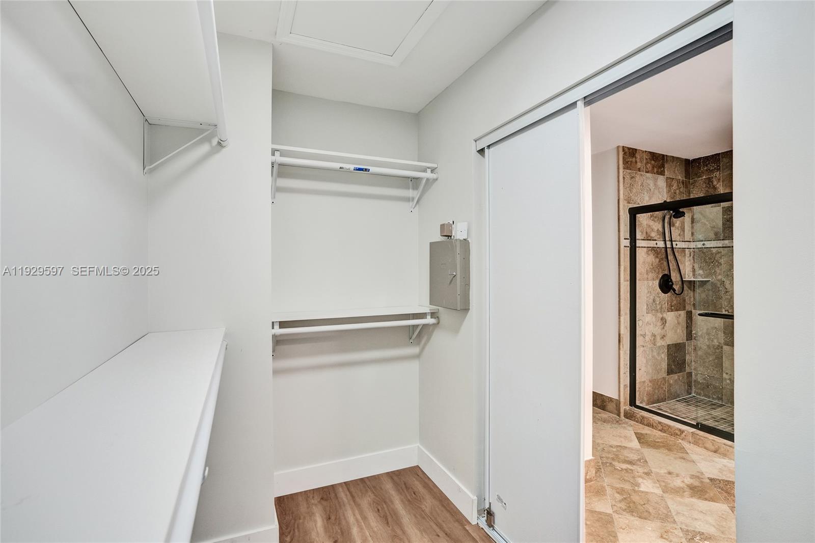 4120 Fern Forest Road Cooper City, FL 33026 - Photo 40 of 44 a view of walk in closet with empty racks