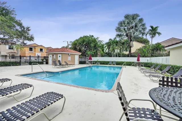 a view of a house with a garden