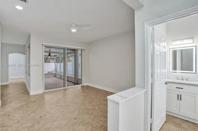 a view of an empty room and window