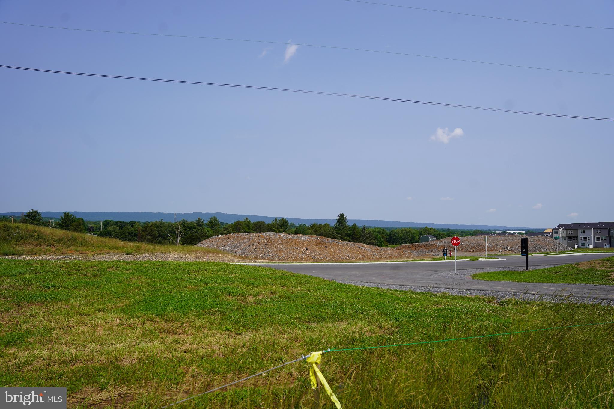 80 Kaiser Lane Inwood, WV 25428 - Photo 6 of 11 a view of a golf course with a lake