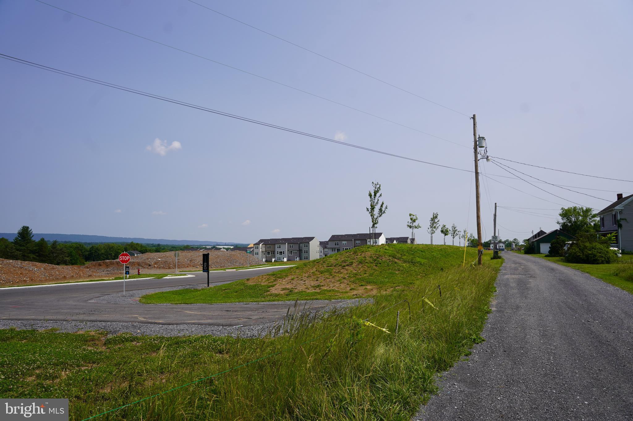 80 Kaiser Lane Inwood, WV 25428 - Photo 7 of 11 a view of a field with clear sky