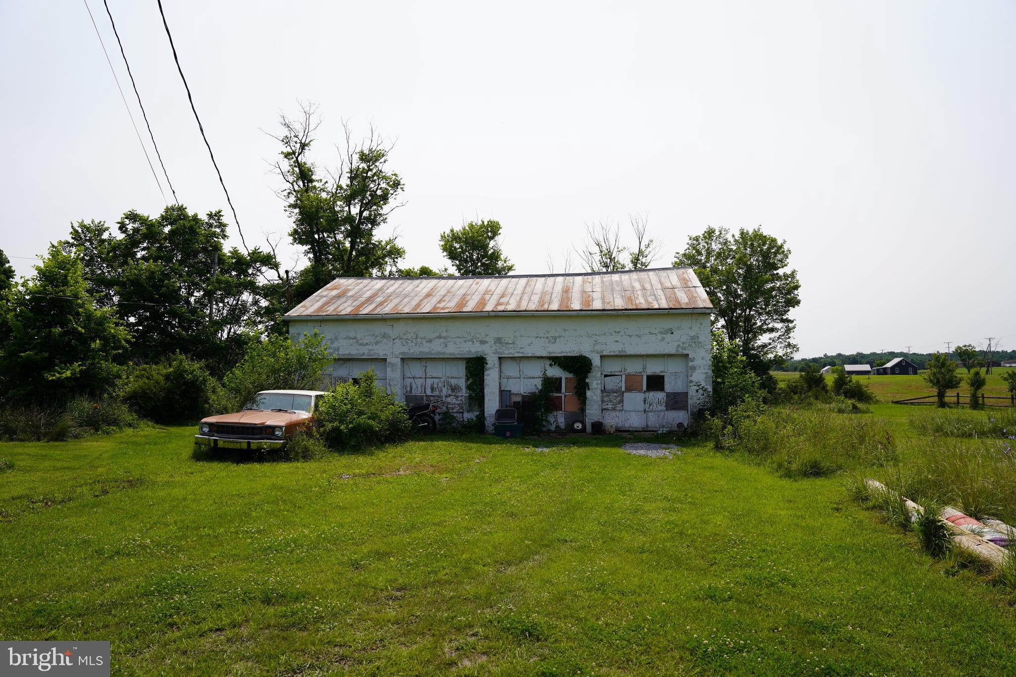 80 Kaiser Lane Inwood, WV 25428 - Photo 8 of 11 a view of a house with a yard and sitting area