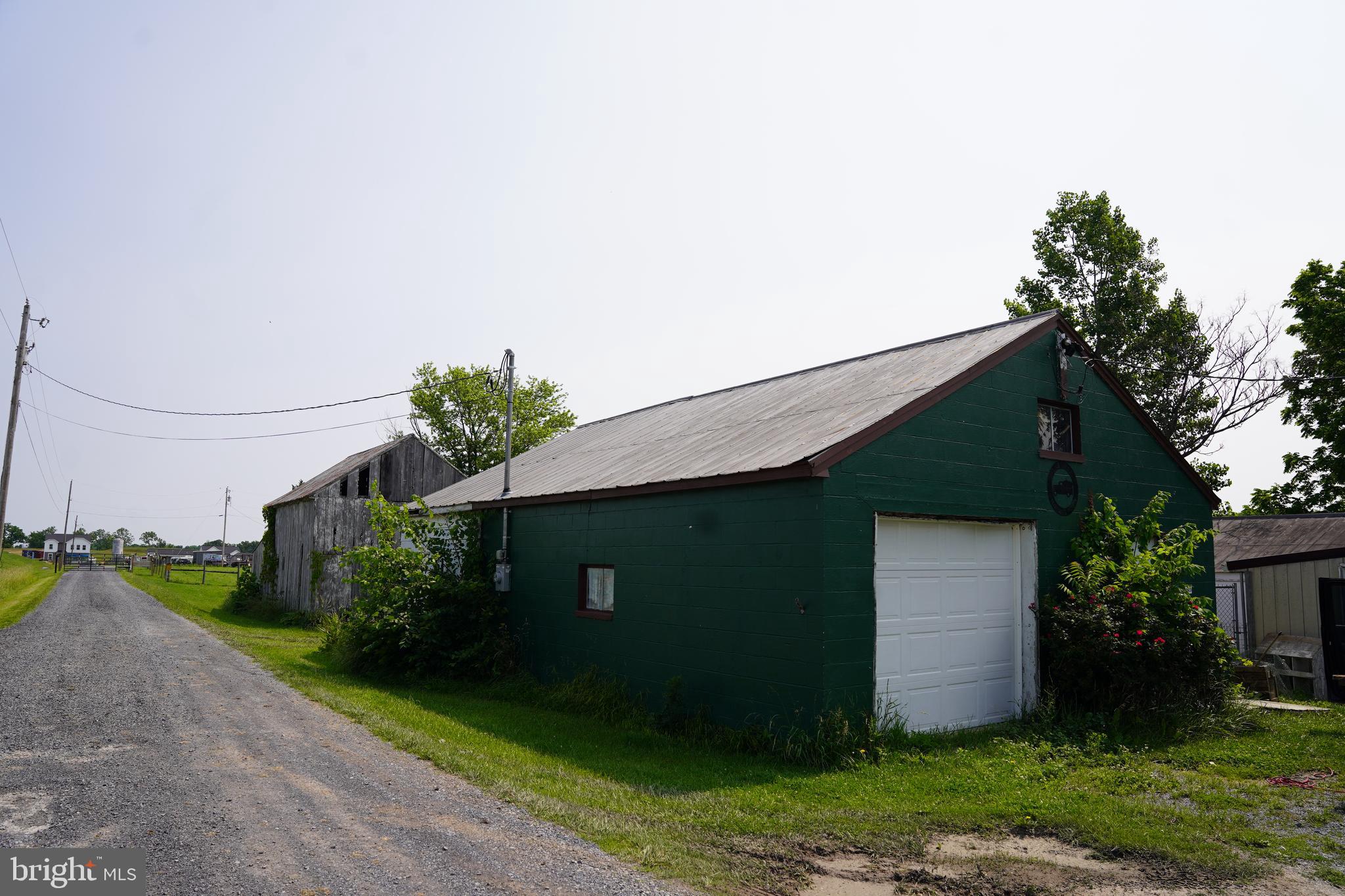80 Kaiser Lane Inwood, WV 25428 - Photo 10 of 11 a front view of a house with garden