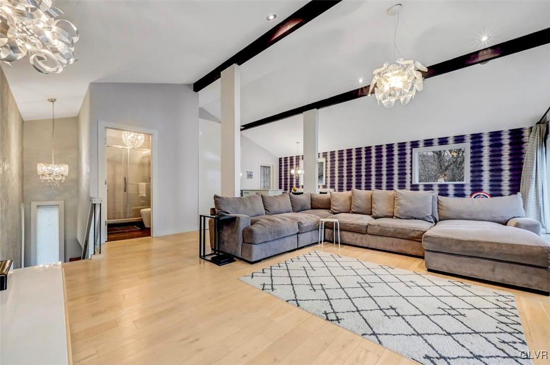 108 Sterling Circle Bushkill, PA 18324 - Photo 14 of 51 a living room with furniture and a chandelier