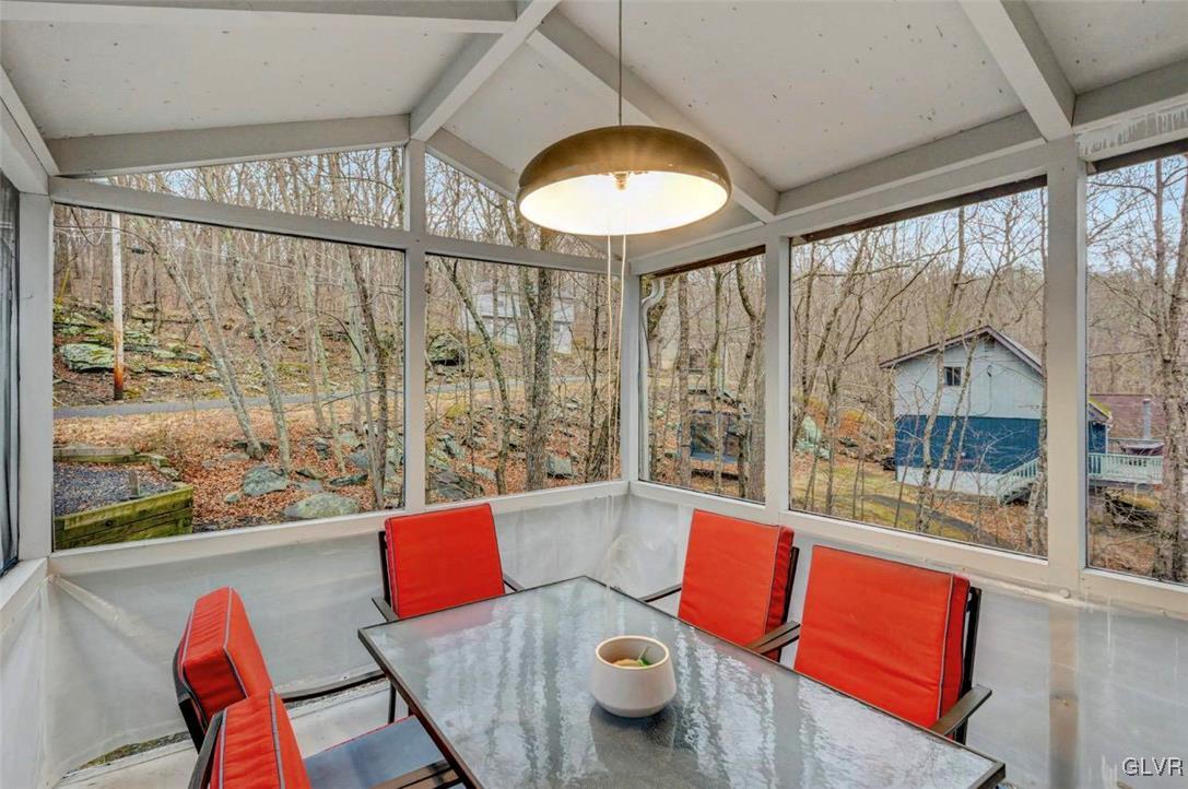 108 Sterling Circle Bushkill, PA 18324 - Photo 19 of 51 a living room with furniture and a large window