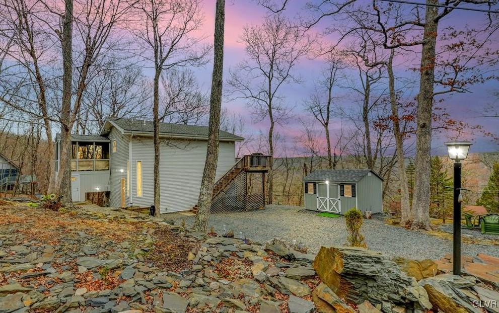 108 Sterling Circle Bushkill, PA 18324 - Photo 2 of 51 a house with trees in front of it