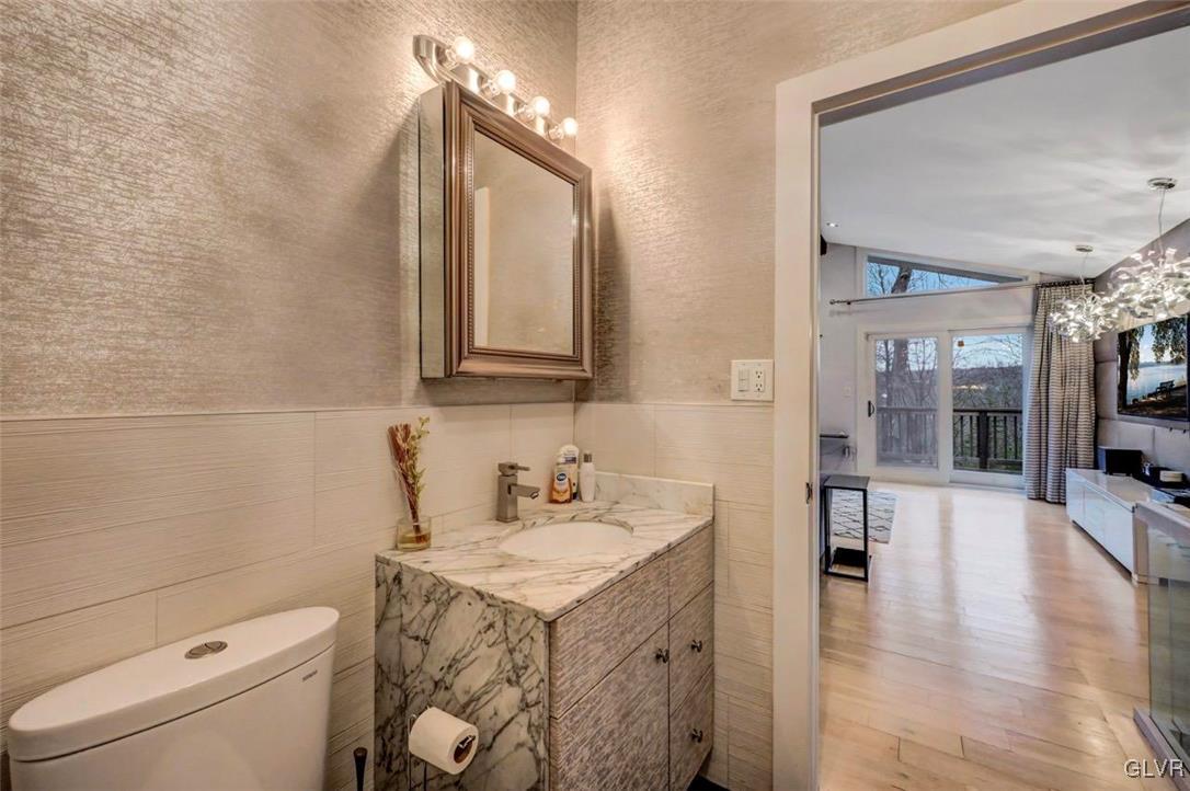 108 Sterling Circle Bushkill, PA 18324 - Photo 26 of 51 a bathroom with a sink and a mirror