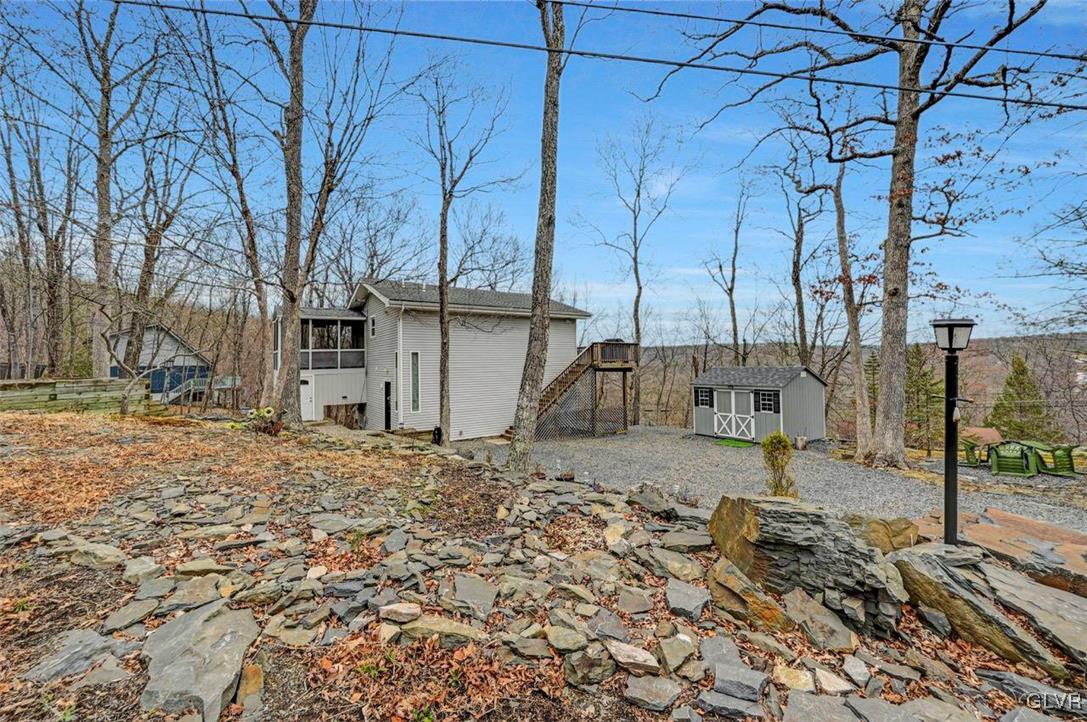 108 Sterling Circle Bushkill, PA 18324 - Photo 3 of 51 a view of a backyard of the house