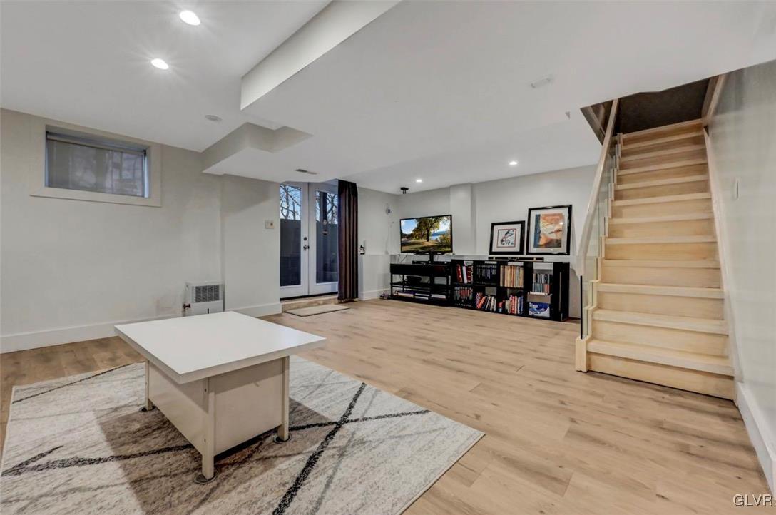 108 Sterling Circle Bushkill, PA 18324 - Photo 40 of 51 a living room with furniture and a wooden floor