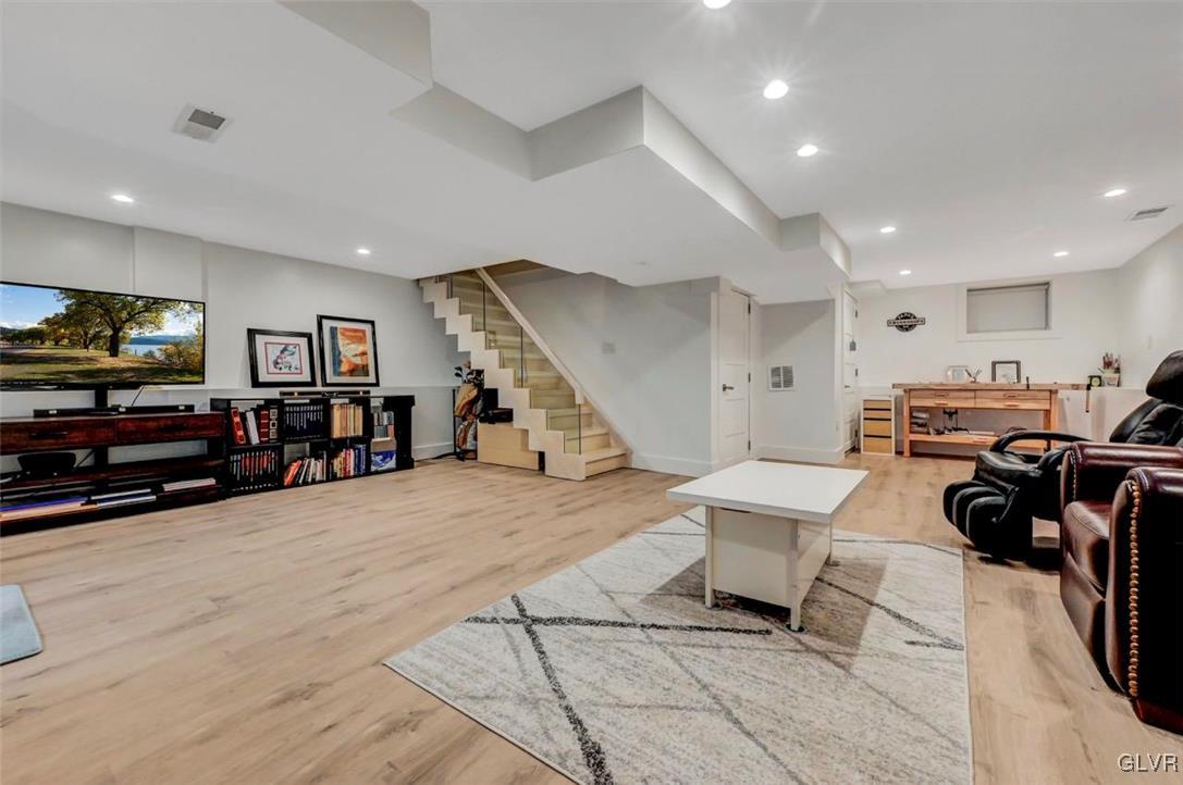 108 Sterling Circle Bushkill, PA 18324 - Photo 42 of 51 a living room with furniture and a flat screen tv