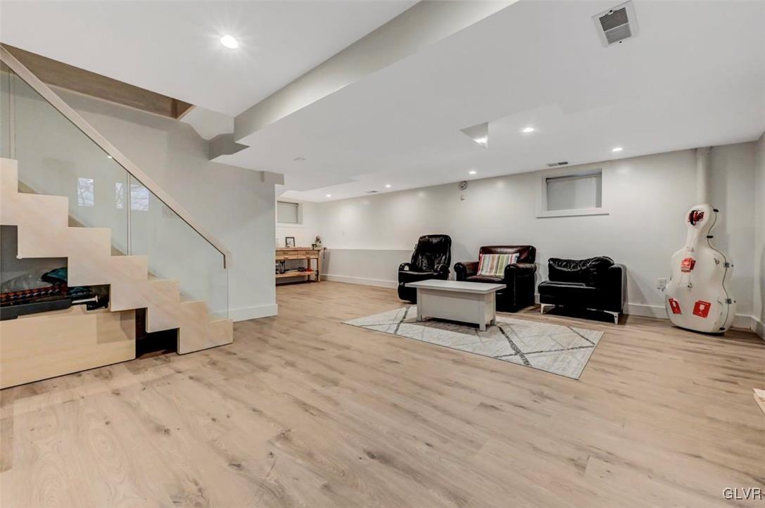 108 Sterling Circle Bushkill, PA 18324 - Photo 43 of 51 a living room with furniture and a wooden floor