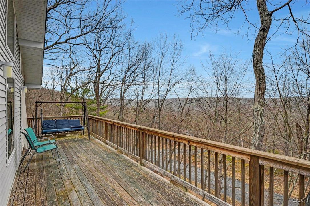108 Sterling Circle Bushkill, PA 18324 - Photo 48 of 51 a view of balcony with wooden floor and outdoor seating