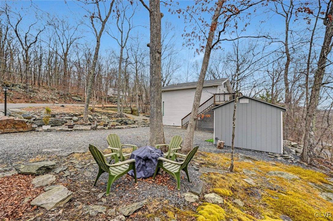108 Sterling Circle Bushkill, PA 18324 - Photo 50 of 51 a view of backyard of house with outdoor seating