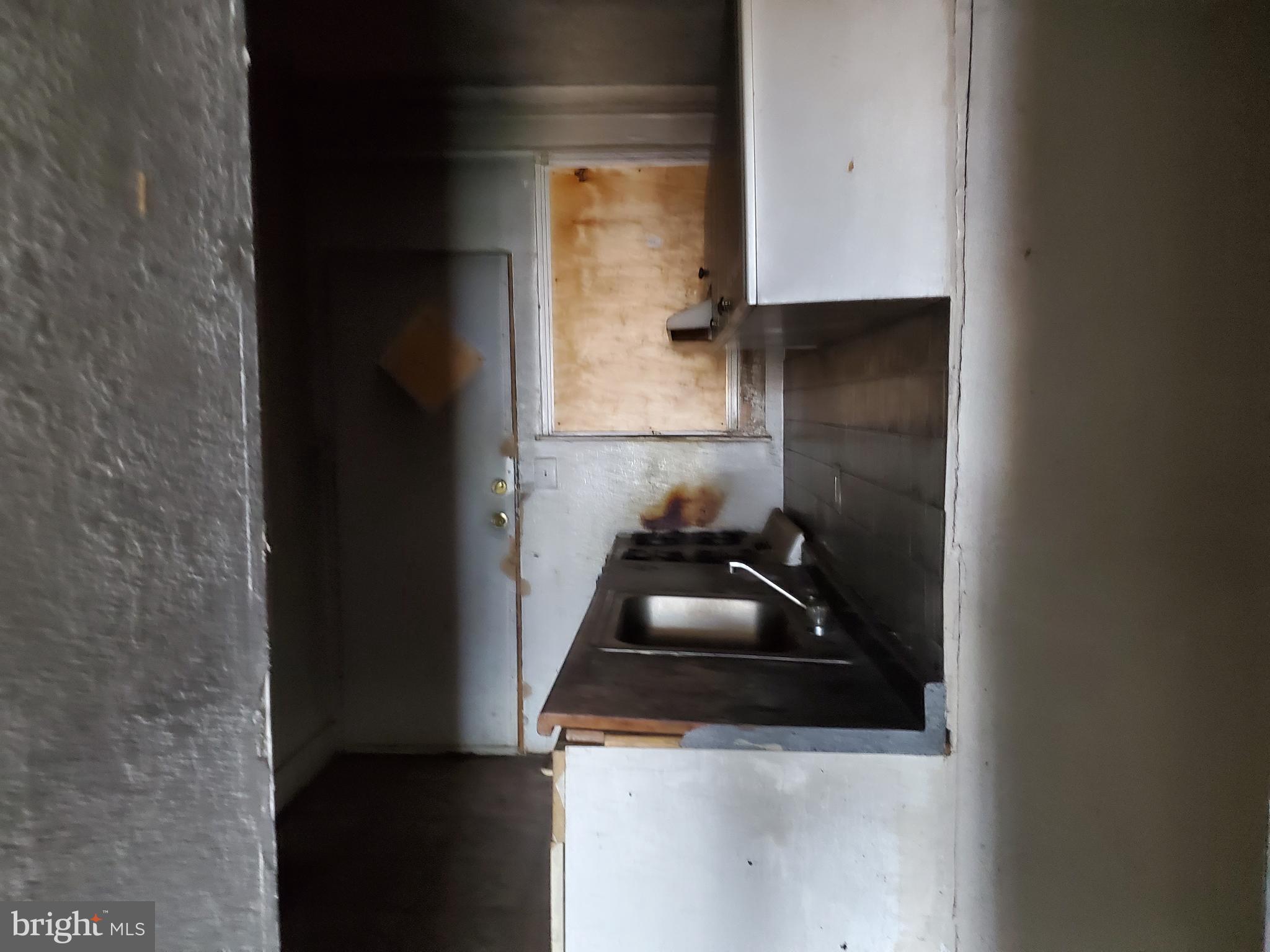 2002 East Rittenhouse Street Philadelphia, PA 19138 - Photo 3 of 10 a kitchen with a sink and cabinets