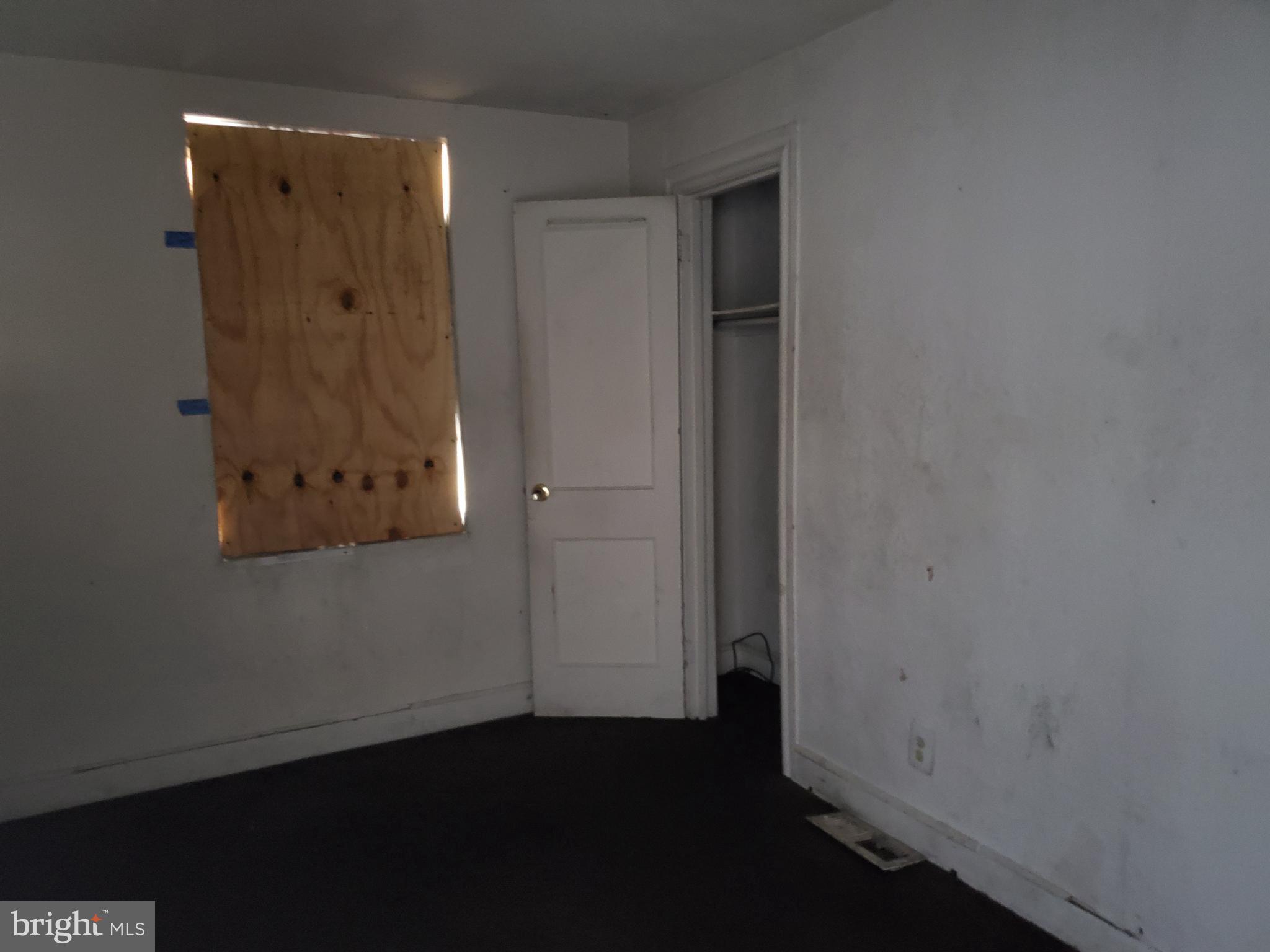 2002 East Rittenhouse Street Philadelphia, PA 19138 - Photo 4 of 10 an empty room with wooden floor