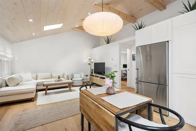 a living room with a couch and a flat screen tv
