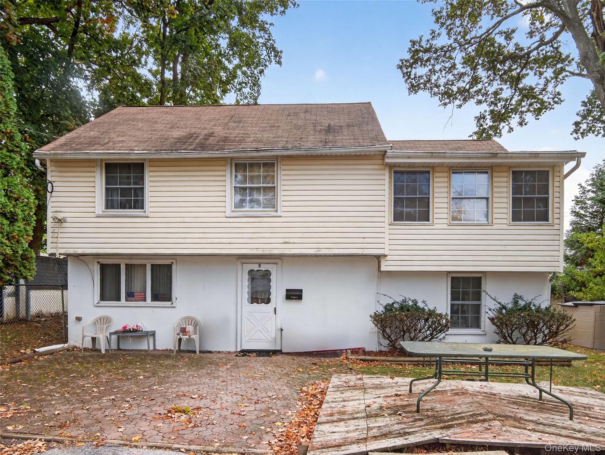 5 Interstate Street Suffern, NY 10901 - Photo 6 of 15 a front view of a house with garden
