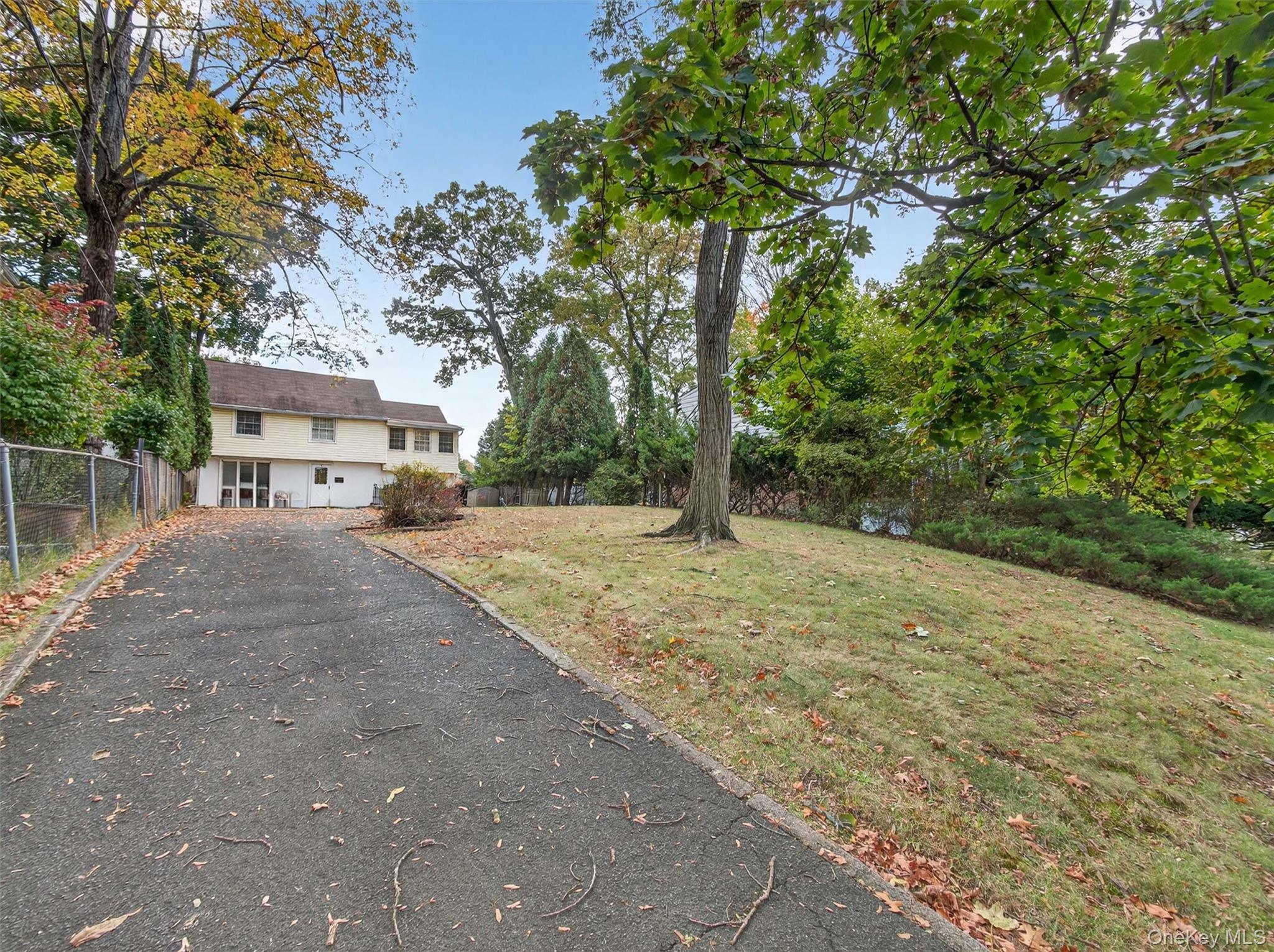 5 Interstate Street Suffern, NY 10901 - Photo 10 of 15 a view of a yard with plants and trees