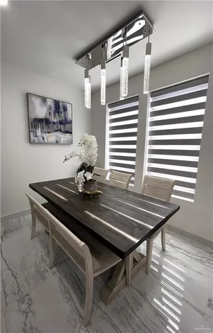 a view of living room with granite countertop furniture and flat screen tv