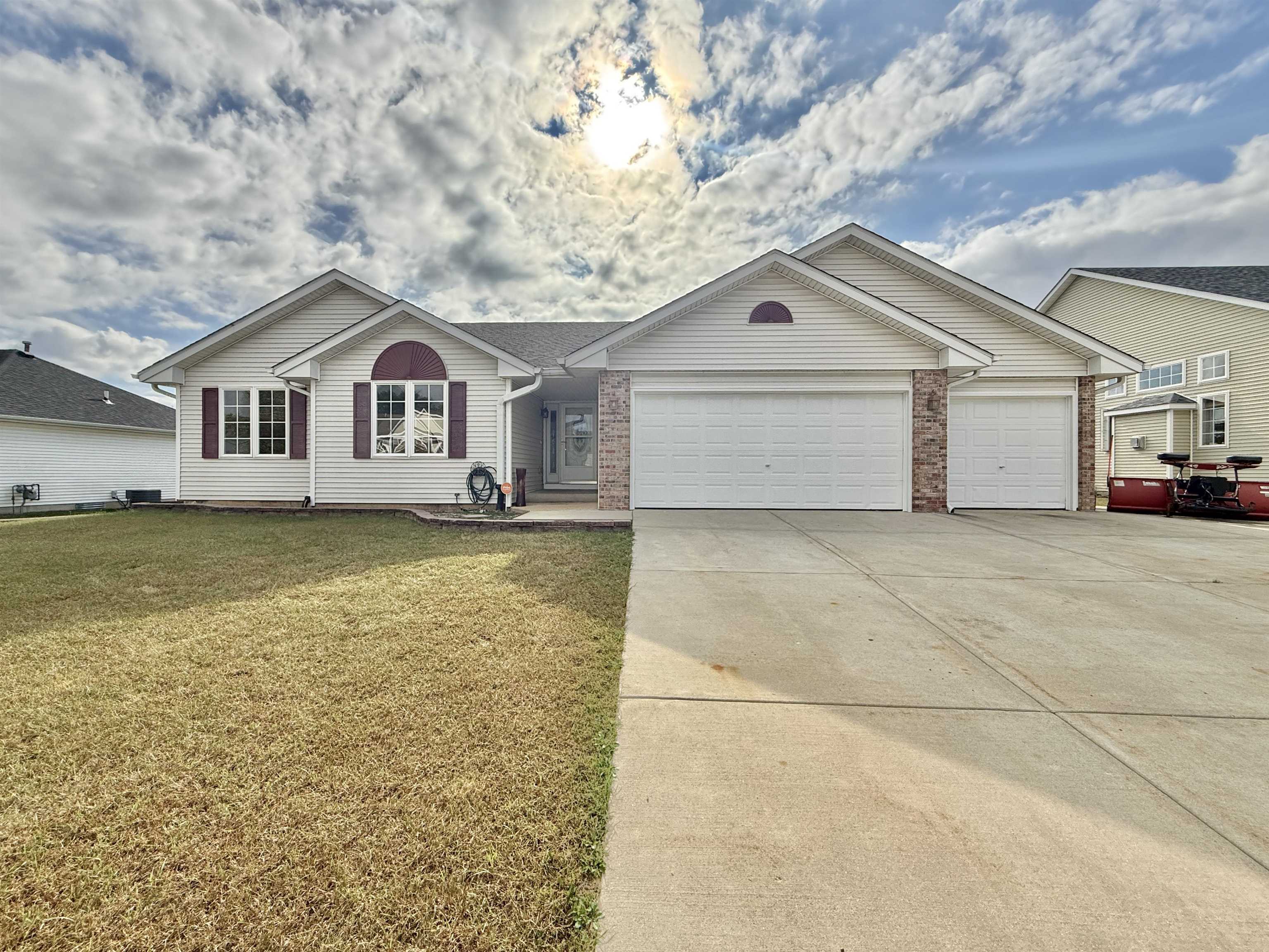 11008 Chicory Ridge Way Roscoe, IL 61073 - Photo 1 of 45 a house view with a garden space