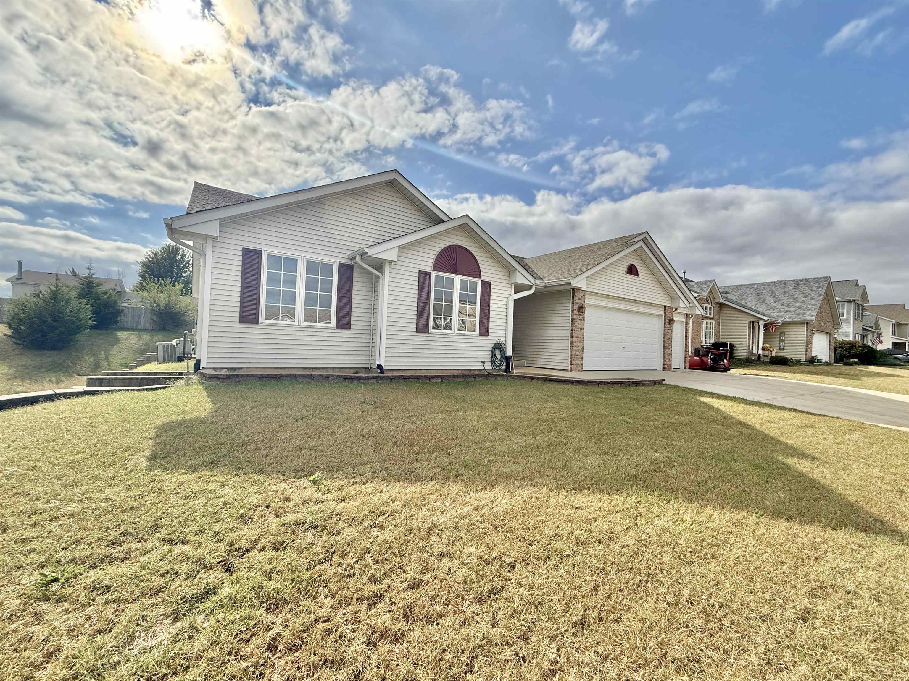11008 Chicory Ridge Way Roscoe, IL 61073 - Photo 2 of 45 a front view of a house with a yard