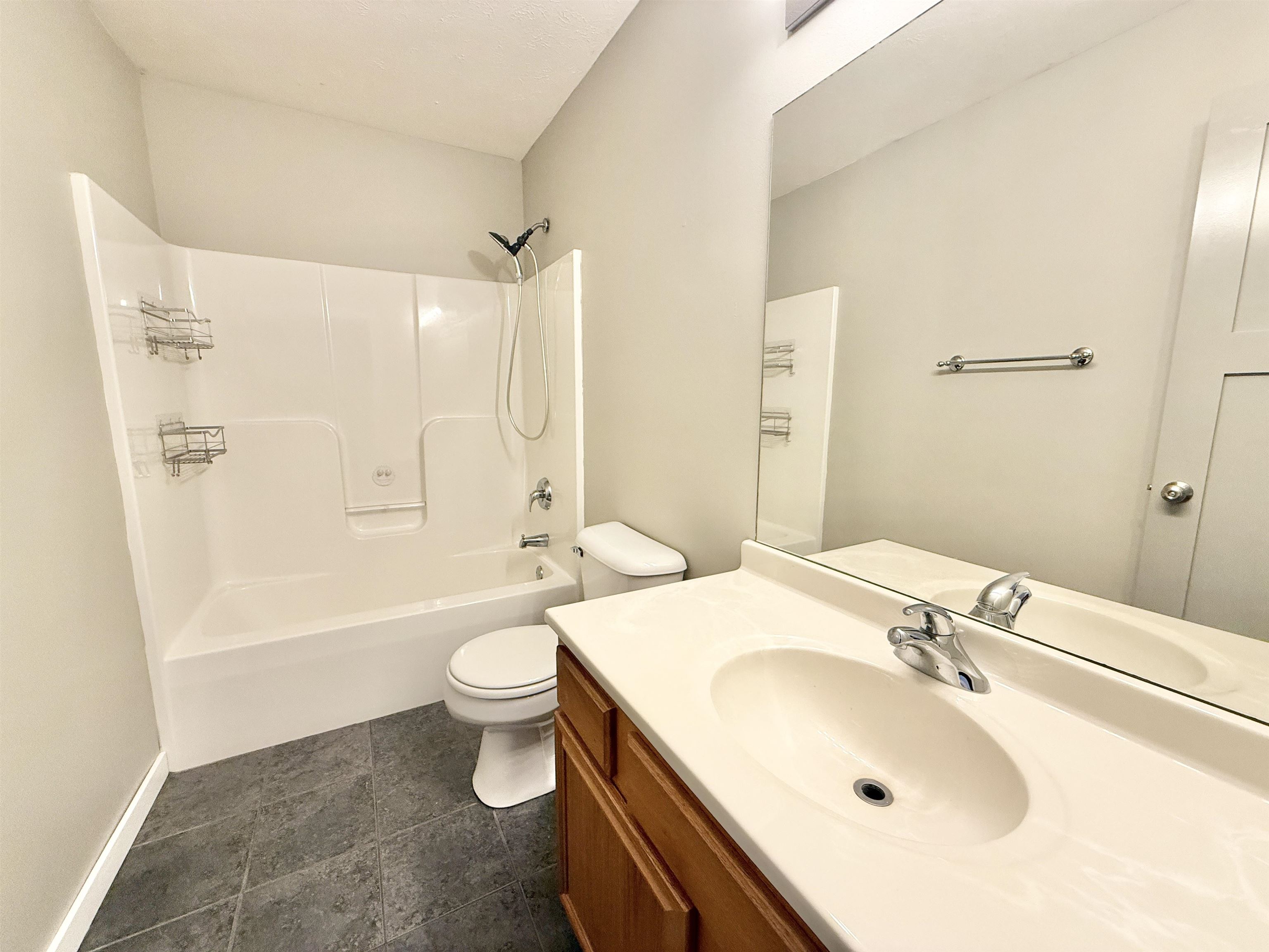 11008 Chicory Ridge Way Roscoe, IL 61073 - Photo 24 of 45 a bathroom with a sink a toilet and shower