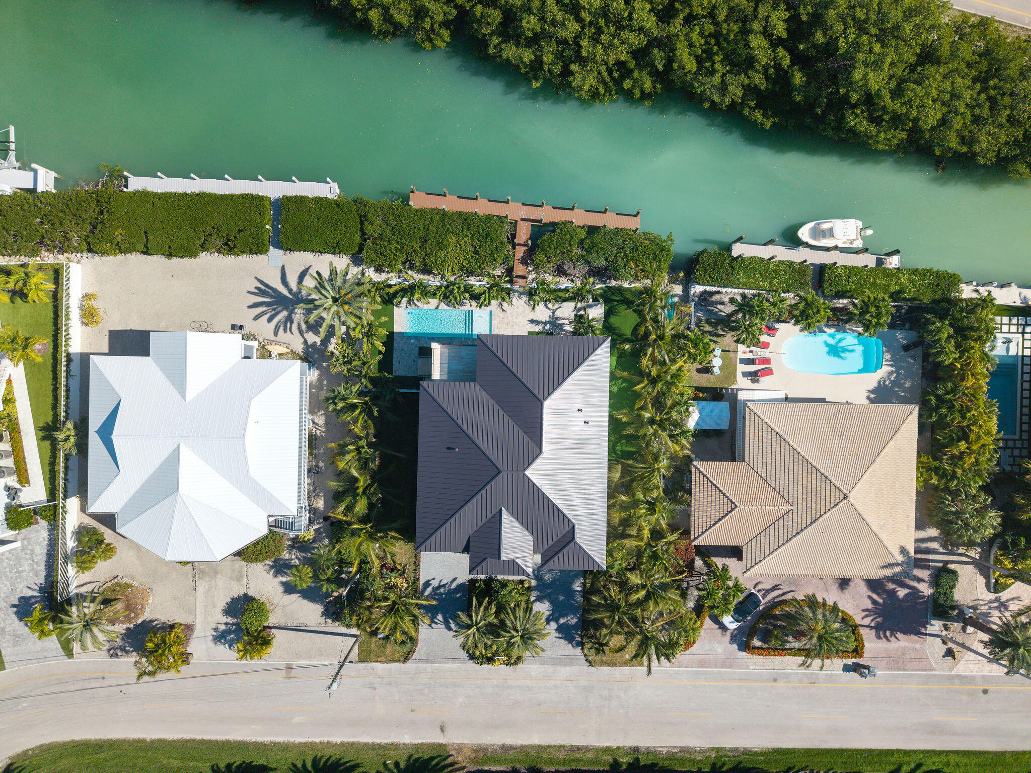 230 15th Circle Key Colony Beach, FL 33051 - Photo 102 of 103 an aerial view of a house with a lake view