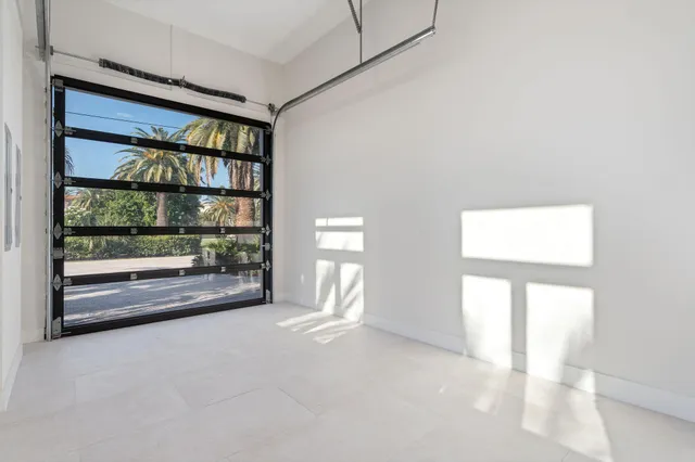 a bath room with a toilet and shower