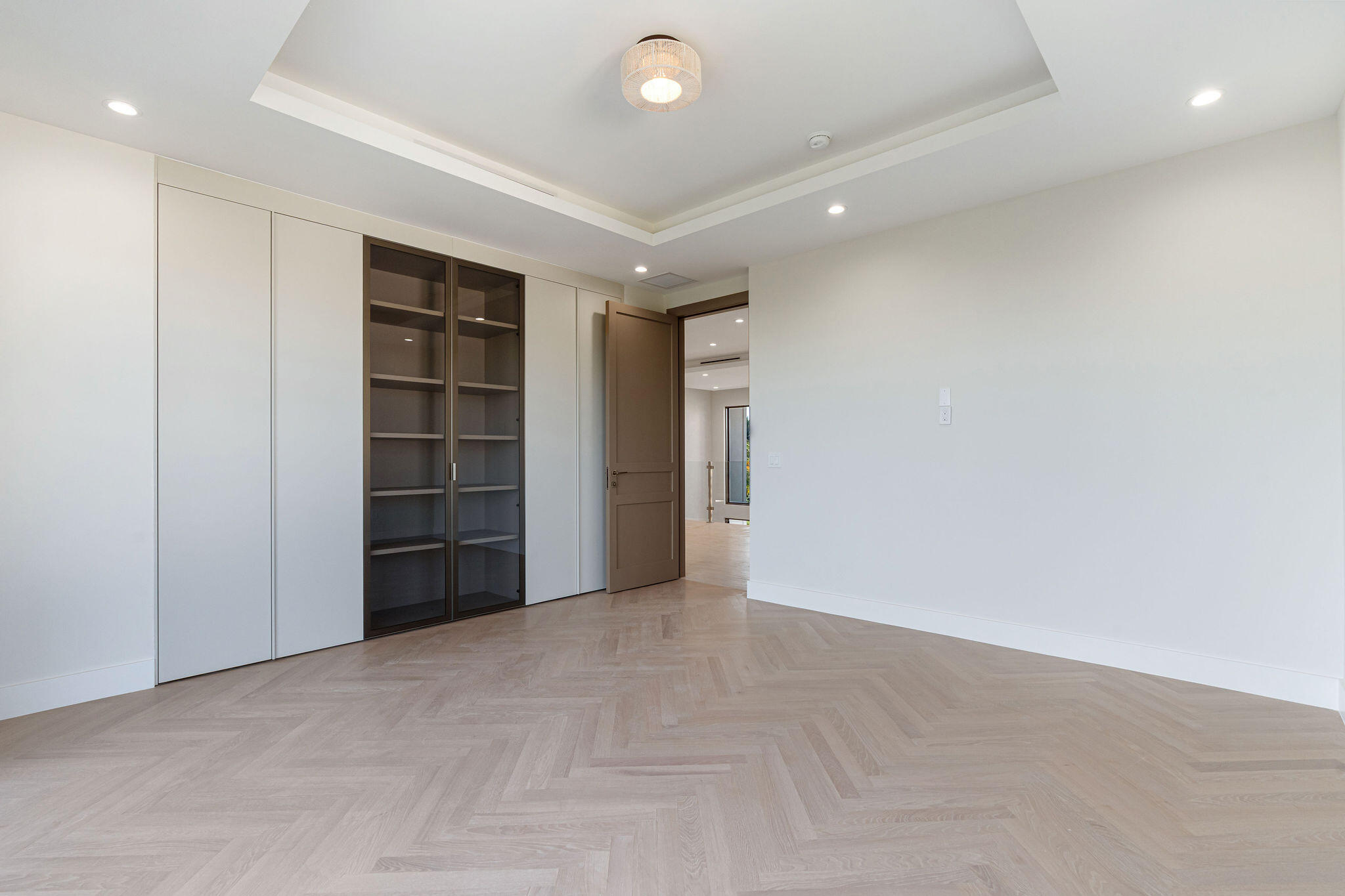 230 15th Circle Key Colony Beach, FL 33051 - Photo 56 of 103 a view of an empty room with a cabinet and mirrors