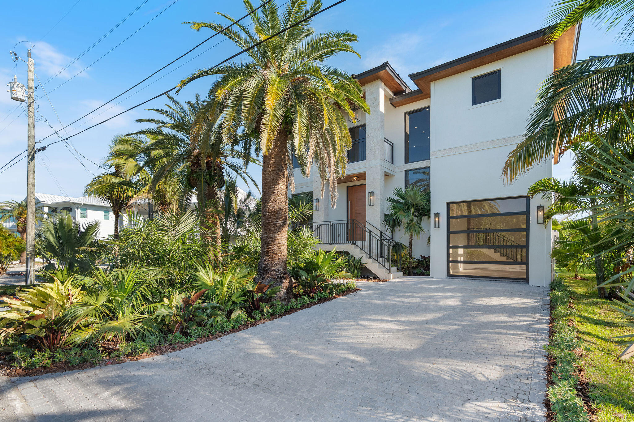 230 15th Circle Key Colony Beach, FL 33051 - Photo 9 of 103 a view of a house with a flower garden