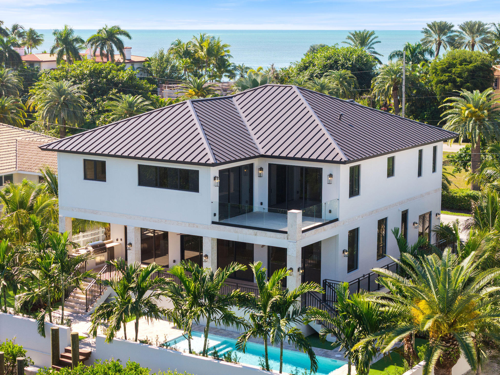 230 15th Circle Key Colony Beach, FL 33051 - Photo 93 of 103 a front view of a house with a garden