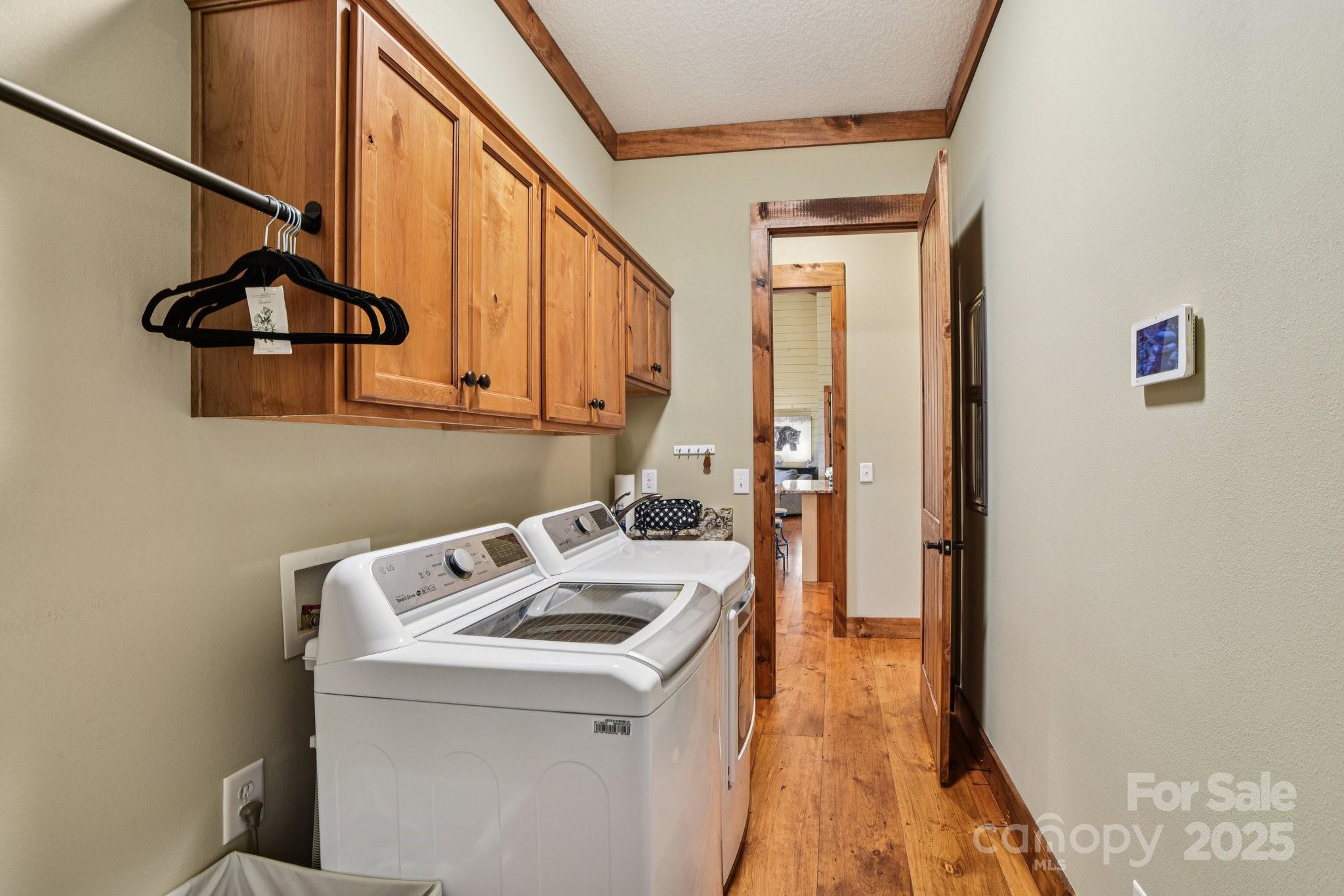 71 Raptor Way Sapphire, NC 28774 - Photo 20 of 46 a utility room with dryer and washer