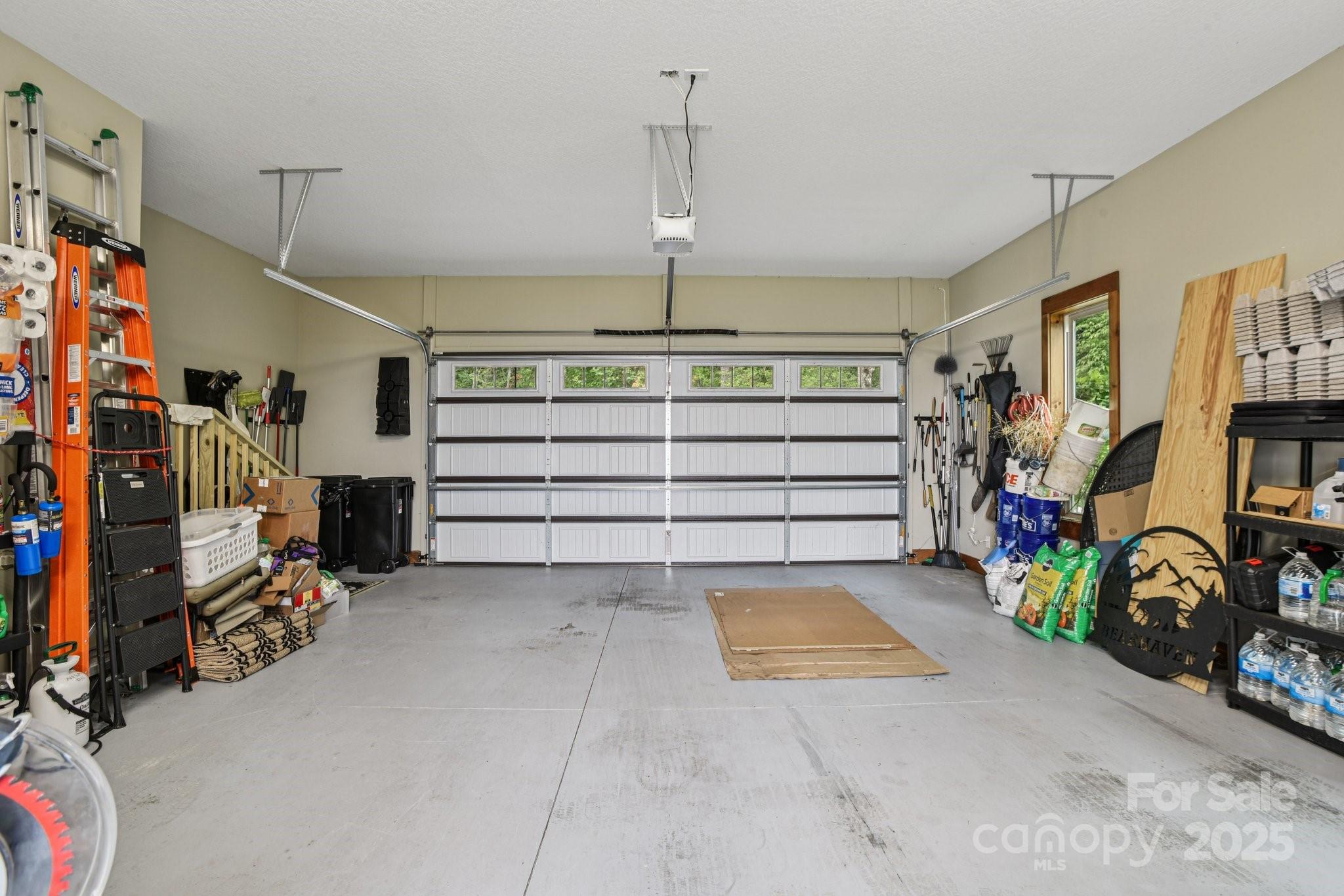 71 Raptor Way Sapphire, NC 28774 - Photo 36 of 46 a view of a room with gym equipment