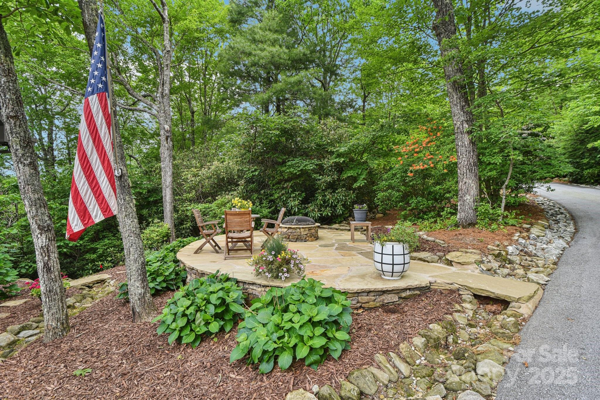 71 Raptor Way Sapphire, NC 28774 - Photo 38 of 46 a view of backyard with swimming pool and green space