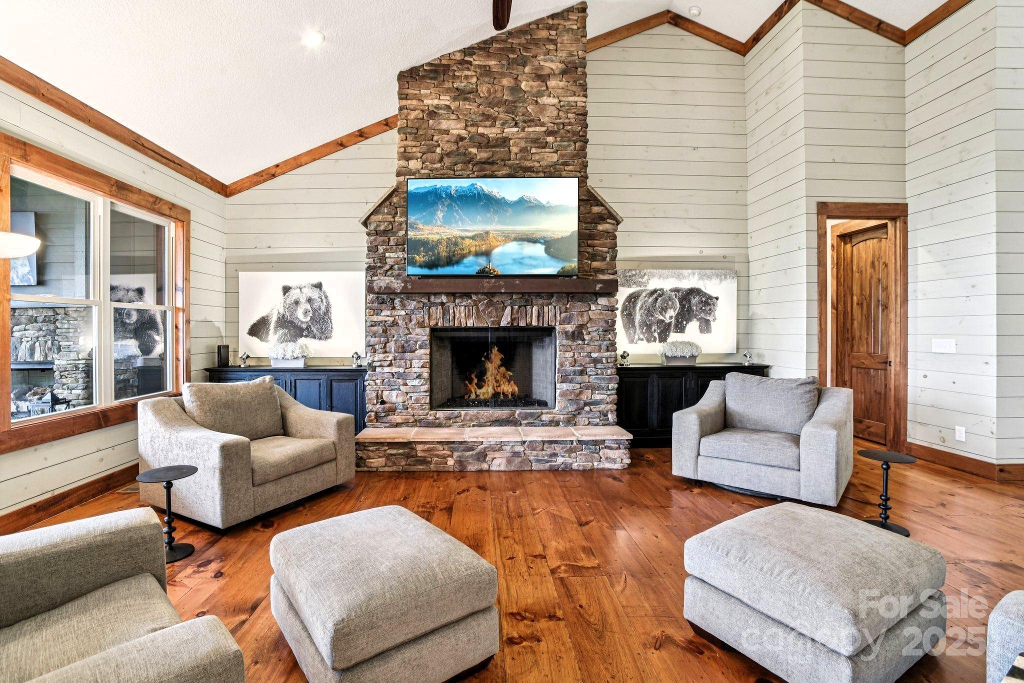 71 Raptor Way Sapphire, NC 28774 - Photo 7 of 46 a living room with furniture and a fireplace