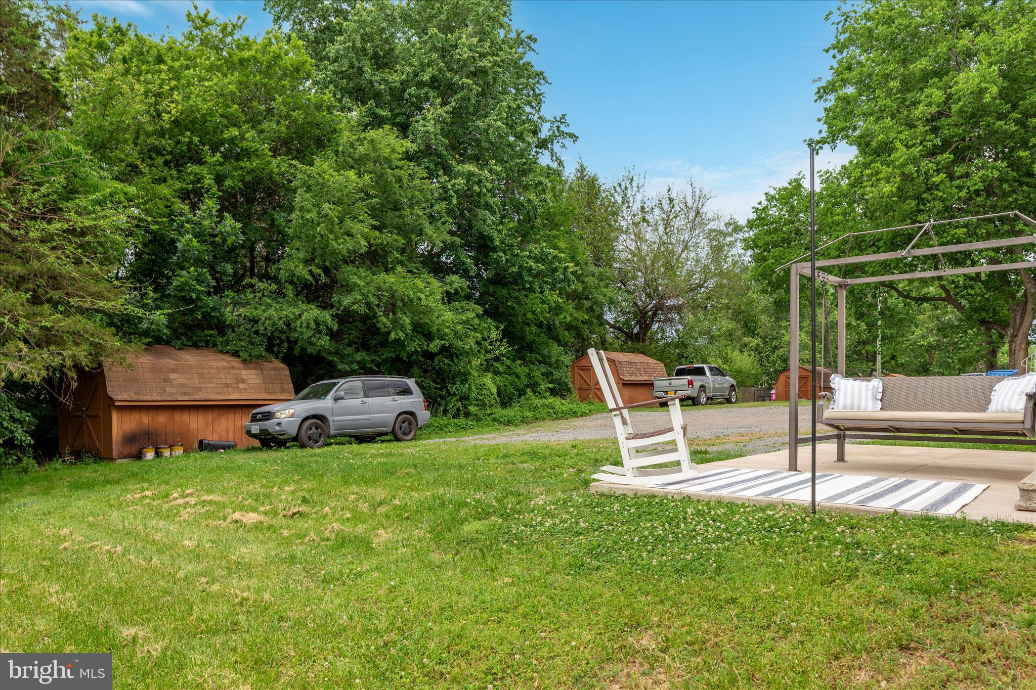 208 North Rappahannock Street Remington, VA 22734 - Photo 18 of 21 a view of a chair and fire pit in the backyard