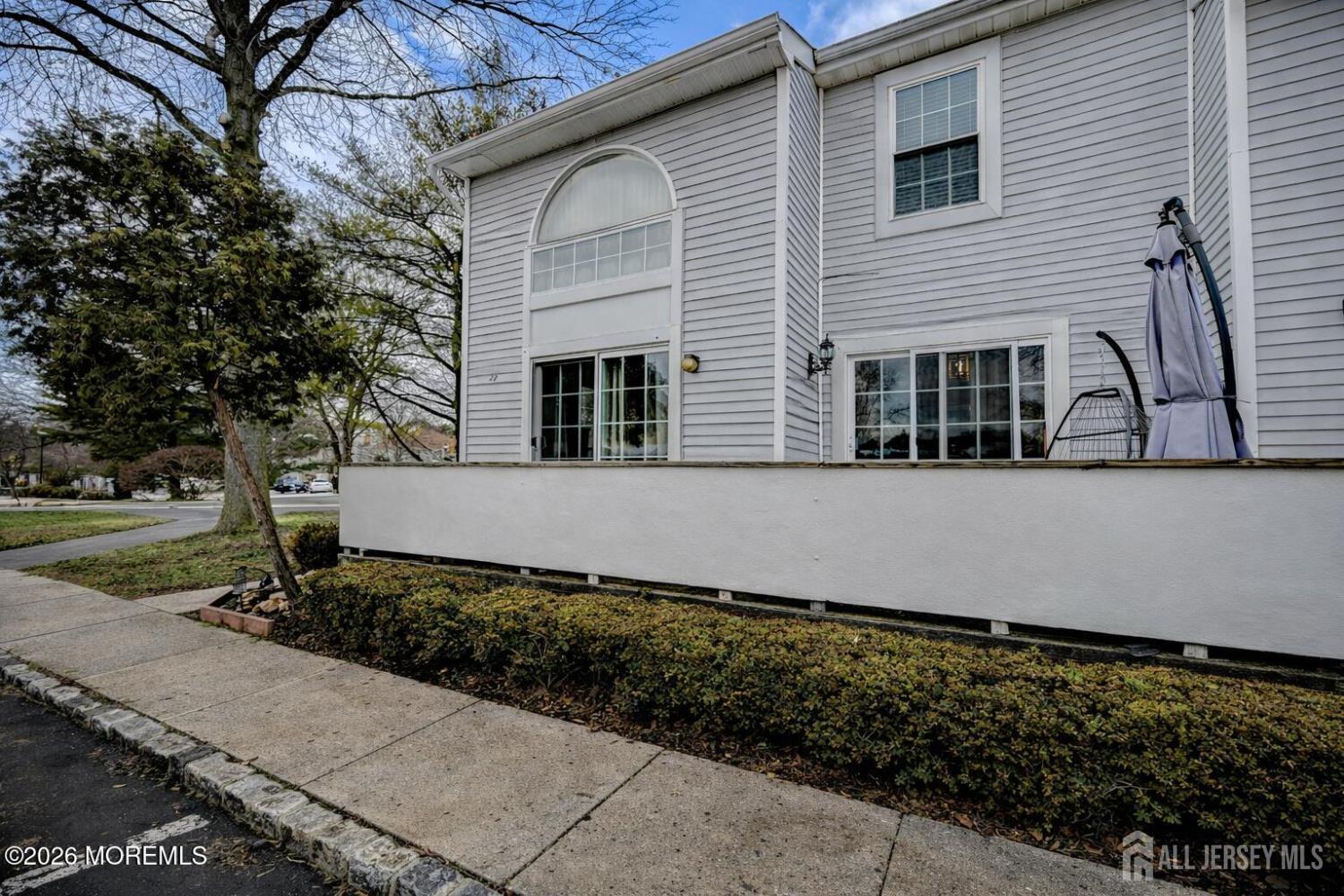 22 Borell Square Parlin, NJ 08859 - Photo 2 of 32 a house with trees in the background