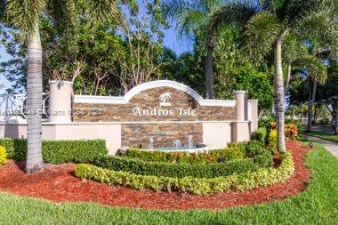 a view of a park that has large trees