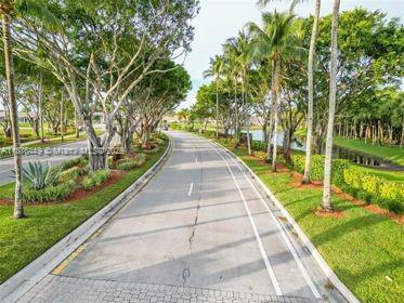 8525 Pine Cay West Palm Beach, FL 33411 - Photo 4 of 40 a view of flowing water with large trees