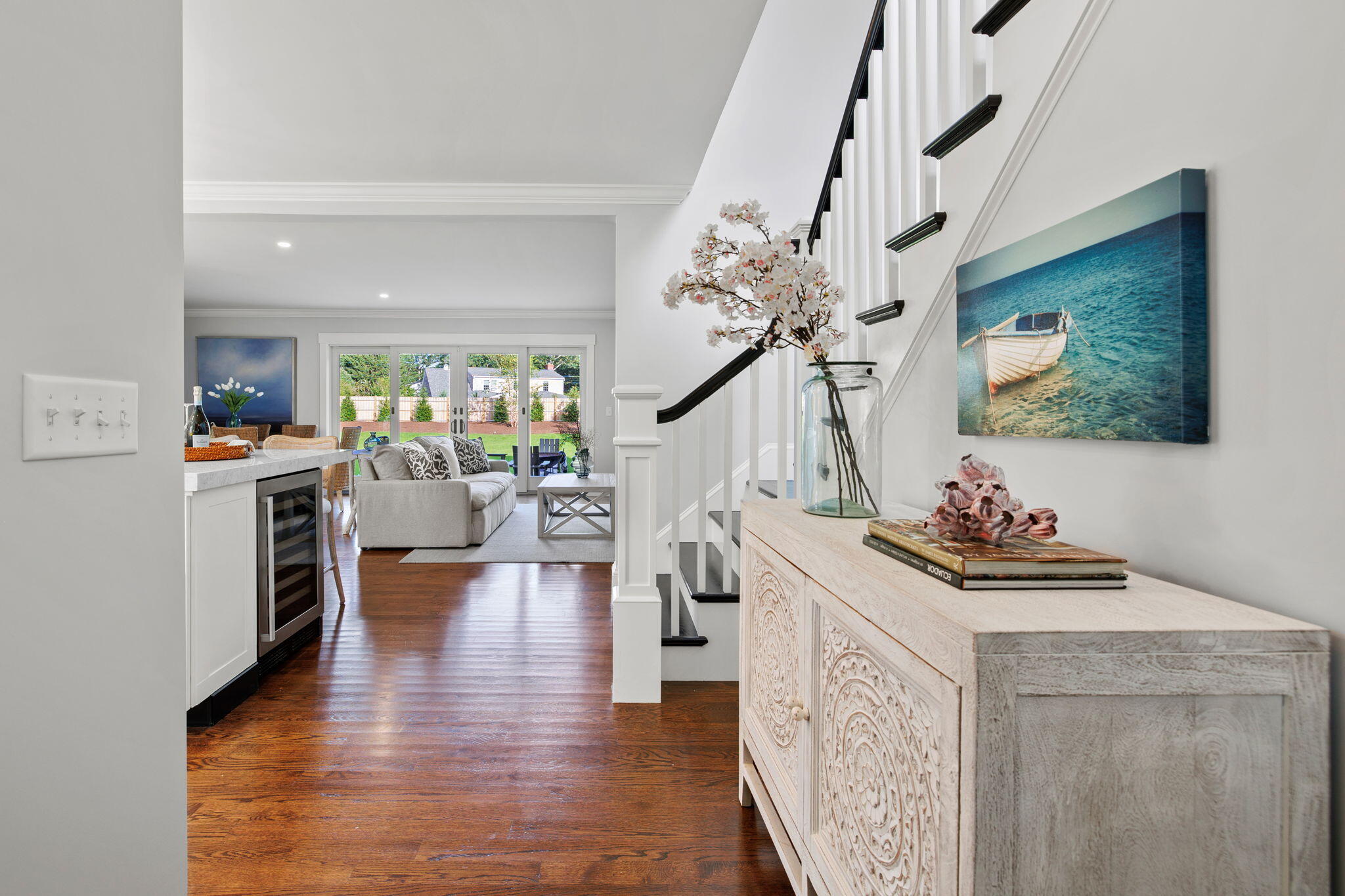 76 Old Mill Road Osterville, MA 02655 - Photo 14 of 45 a living room with furniture and a chandelier